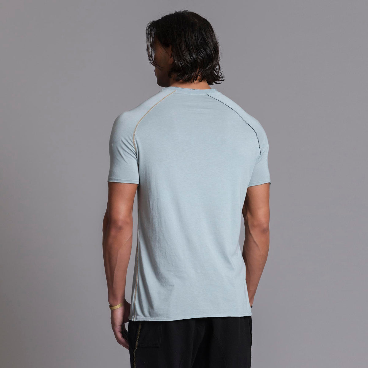 Male modeling agave teal ultimate tee shirt