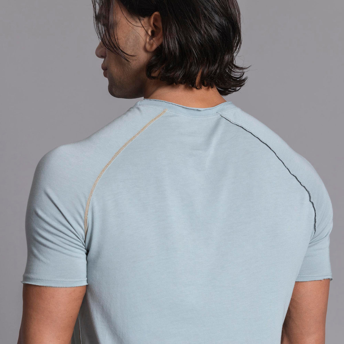Male modeling agave teal ultimate tee shirt