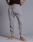 A man modeling Deep Clay gray colored jogger pants