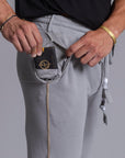 A man modeling Deep Clay gray colored jogger pants