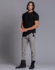 A man modeling Deep Clay gray colored jogger pants