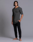 A man modeling black colored jogger pants
