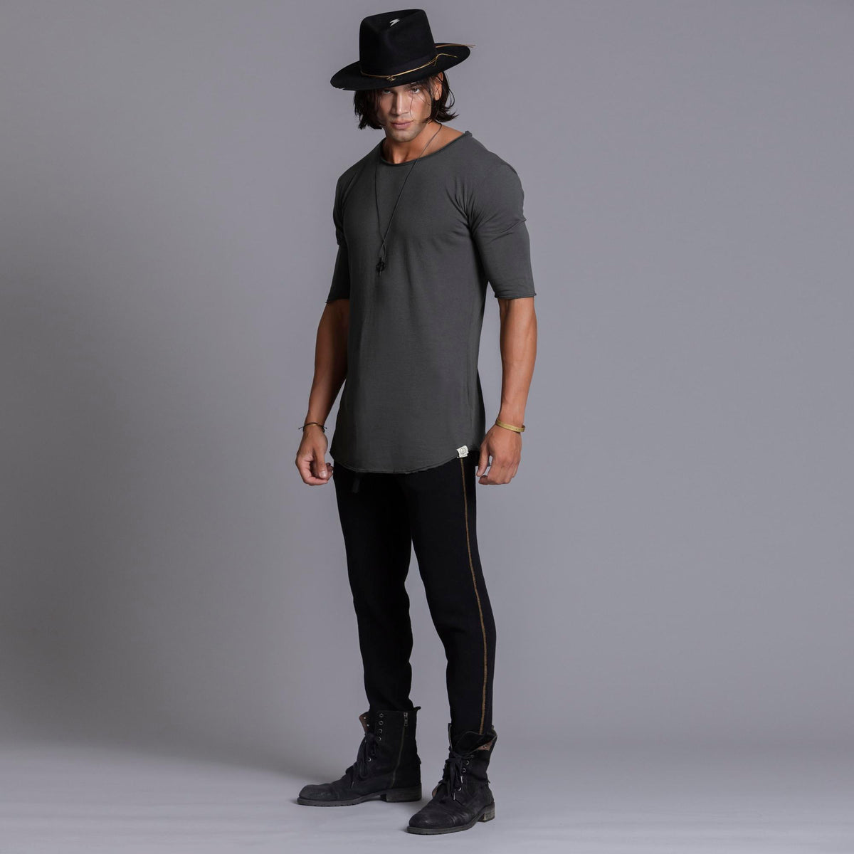 A man modeling black colored jogger pants