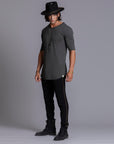 A man modeling black colored jogger pants
