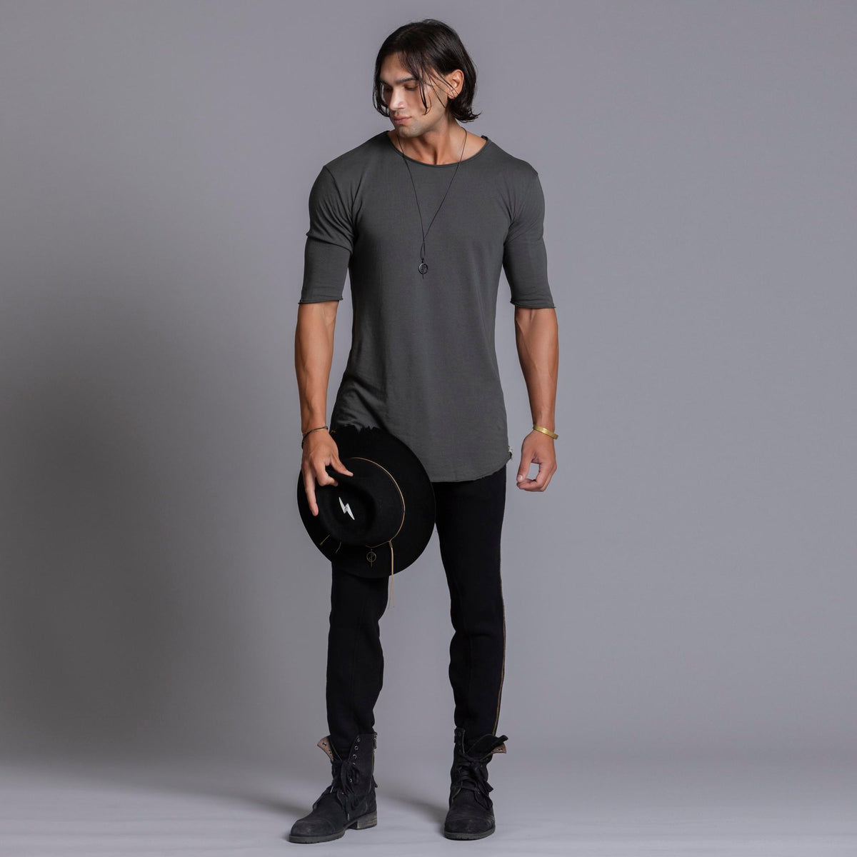 A man modeling black colored jogger pants