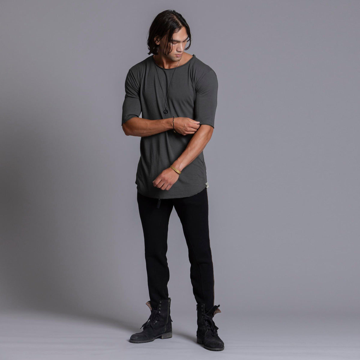 A man modeling black colored jogger pants
