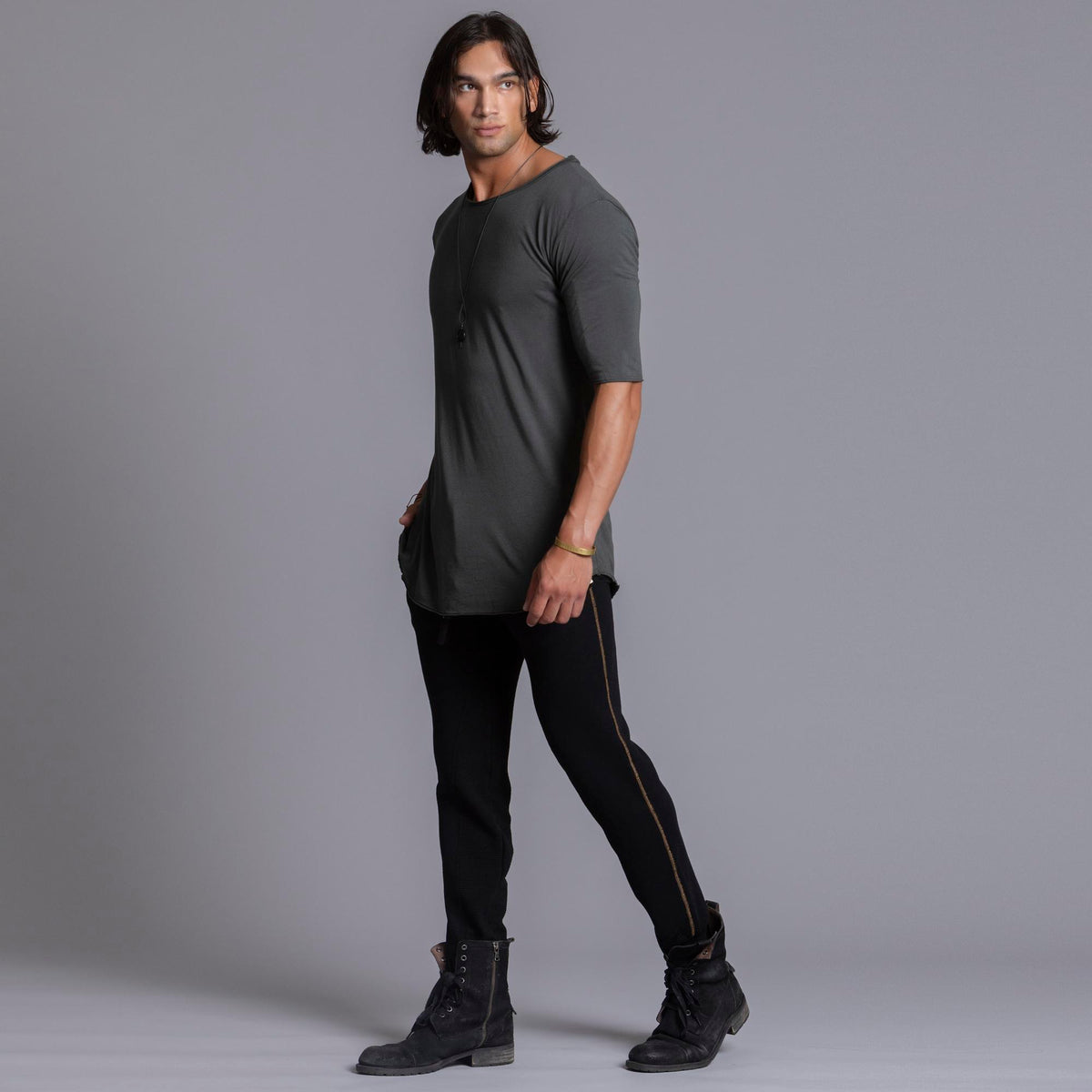 A man modeling black colored jogger pants
