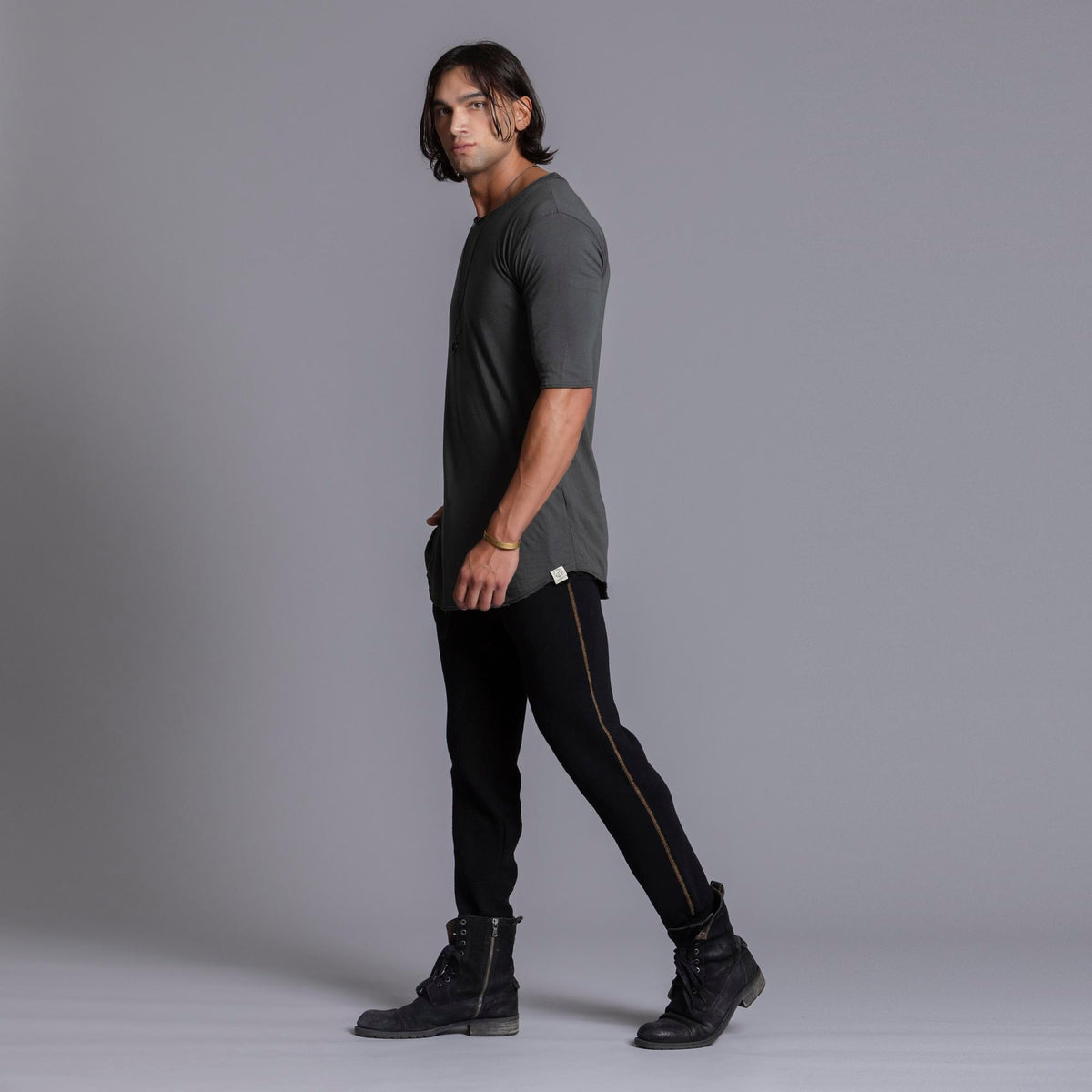 A man modeling black colored jogger pants