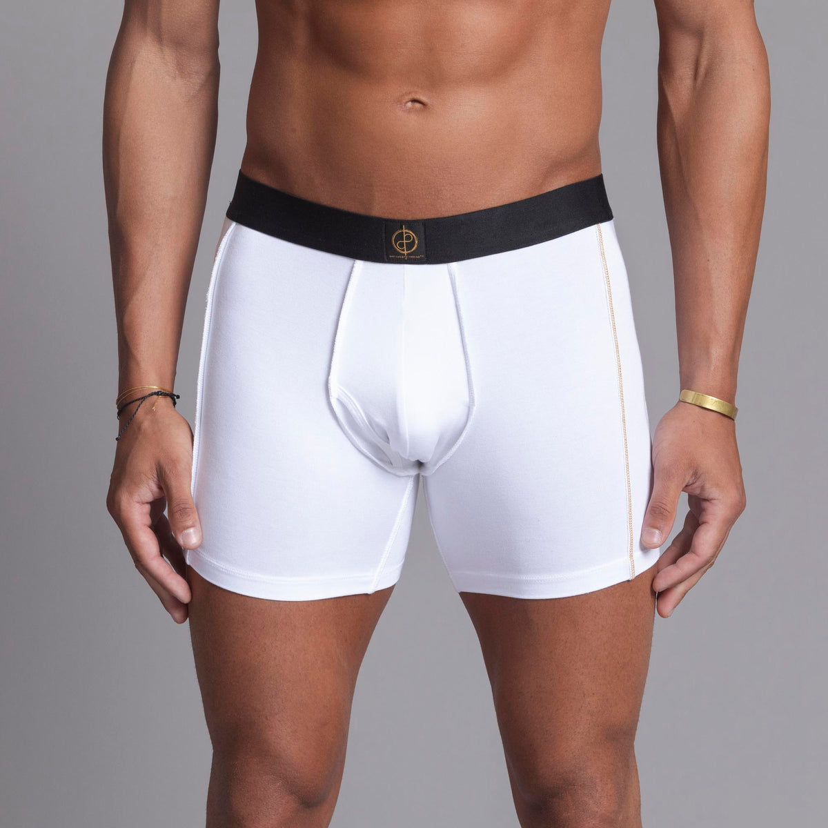 A man modeling the One Golden Thread Unders in White