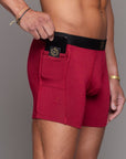 A man modeling the One Golden Thread Unders in Wine Red