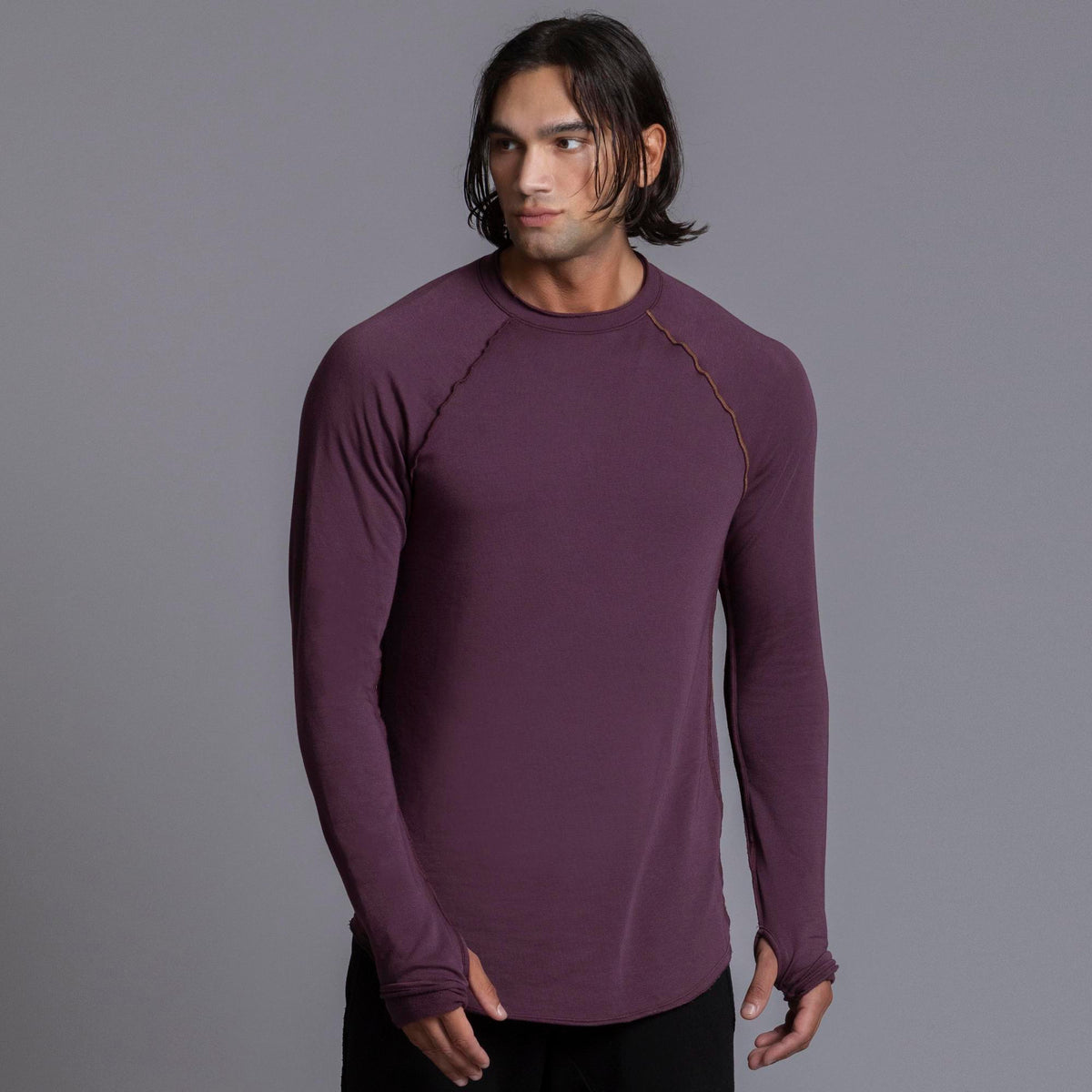 Male modeling purple long sleeve raglan