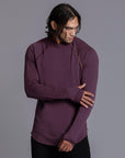 Male modeling purple long sleeve raglan