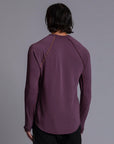 Male modeling purple long sleeve raglan
