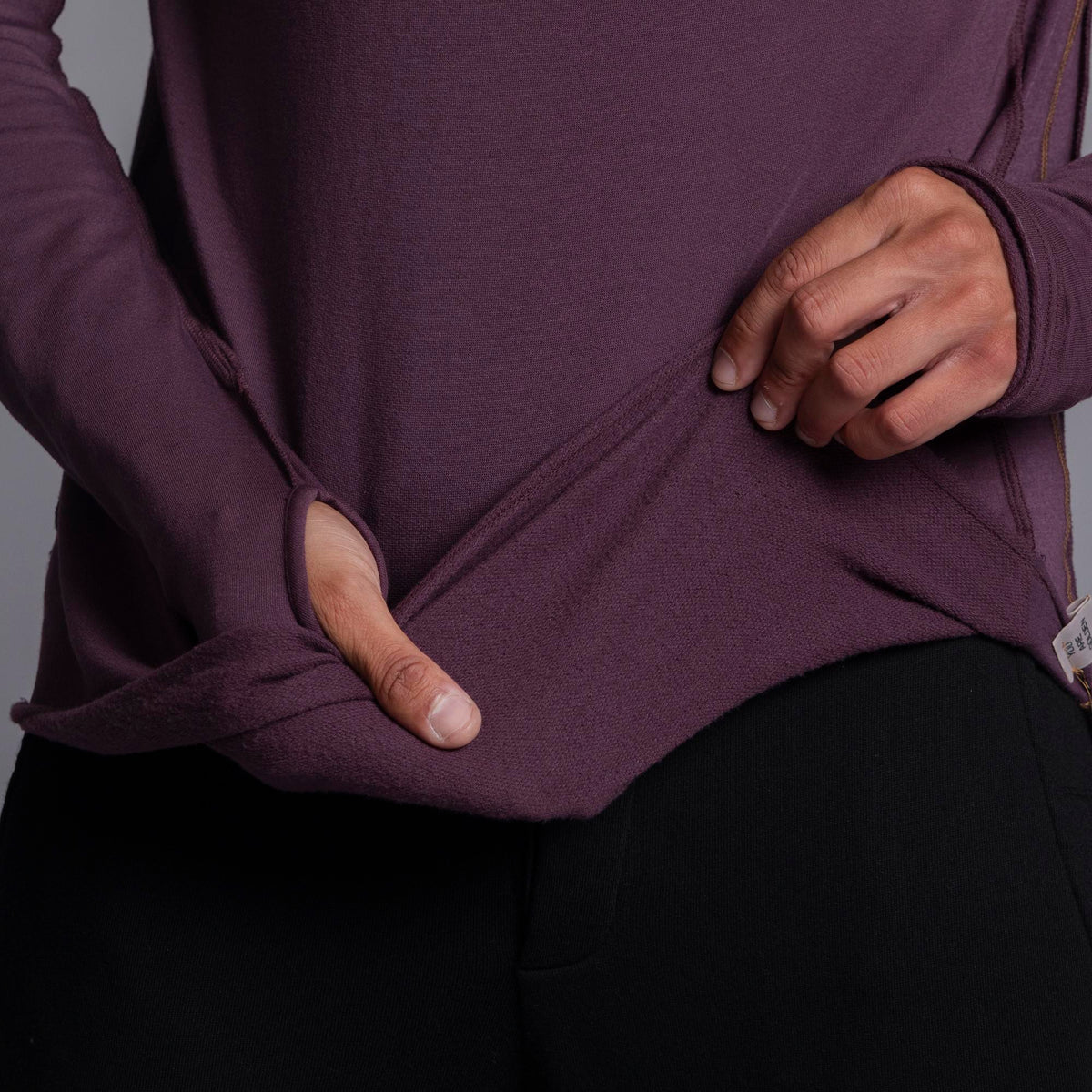 Male modeling purple long sleeve raglan