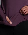 Male modeling purple long sleeve raglan