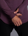Male modeling purple long sleeve raglan