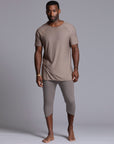 Male modeling Deep Clay gray colored yogo mid shorts