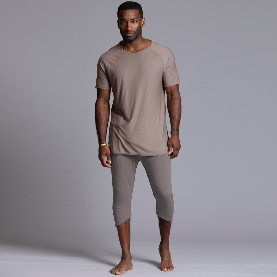 Male modeling Deep Clay gray colored yogo mid shorts