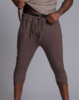 Male modeling Brazen colored yogo mid pants