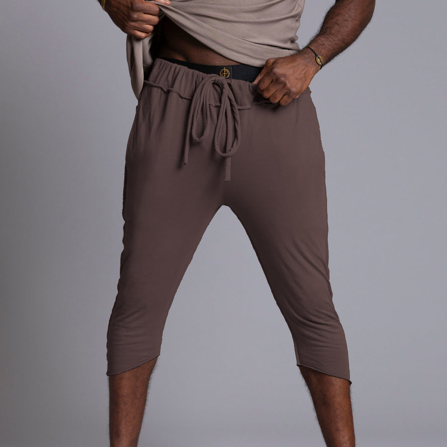 Male modeling Brazen colored yogo mid pants