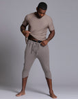 Male modeling Deep Clay gray colored yogo mid shorts