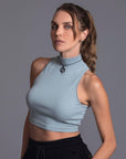 Woman modeling high neck crop in Agave