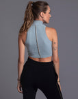 Woman modeling high neck crop in Agave