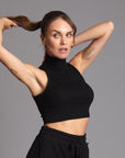 Woman modeling high neck crop in Black
