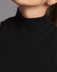 Woman modeling high neck crop in Black