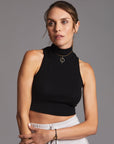 Woman modeling high neck crop in Black