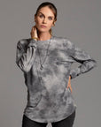 Woman modeling long sleeve crew shirt in rain cloud