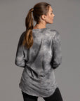 Woman modeling long sleeve crew shirt in rain cloud
