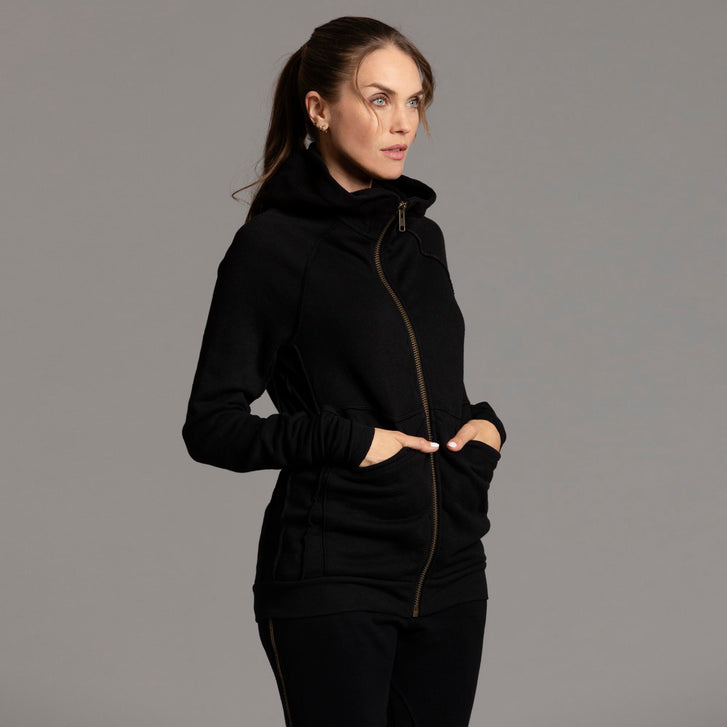 Woman modeling zip tree hoodie in Black