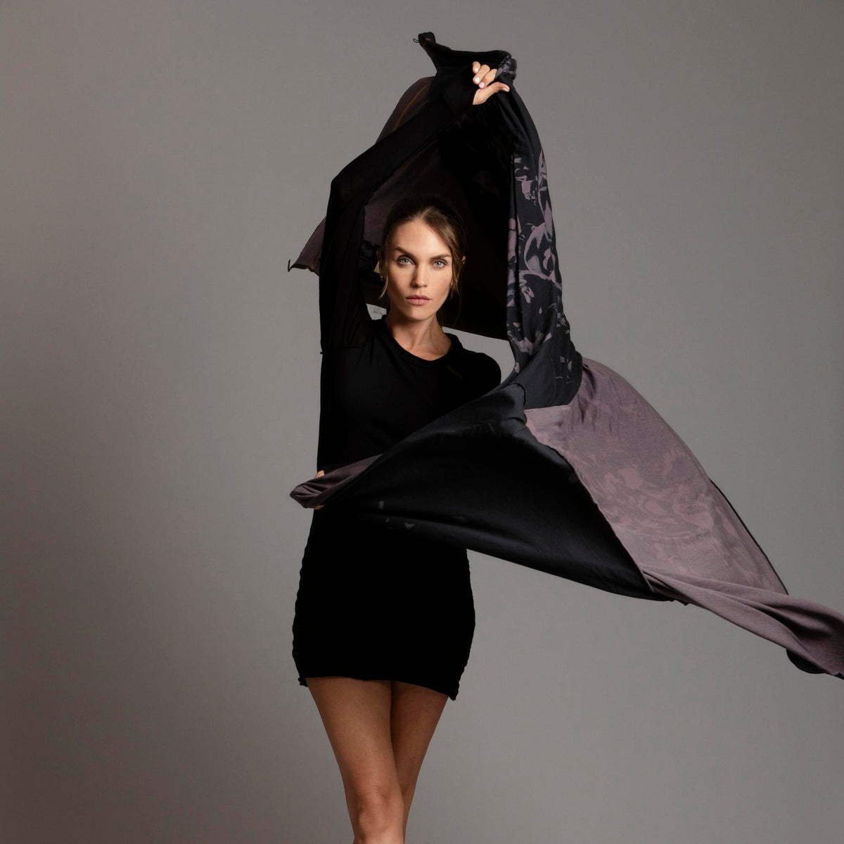 Woman modeling purple Benzova pattern nature wrap