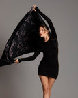 Woman modeling purple Benzova pattern nature wrap