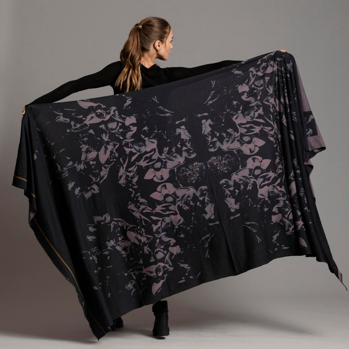 Woman modeling purple Benzova pattern nature wrap