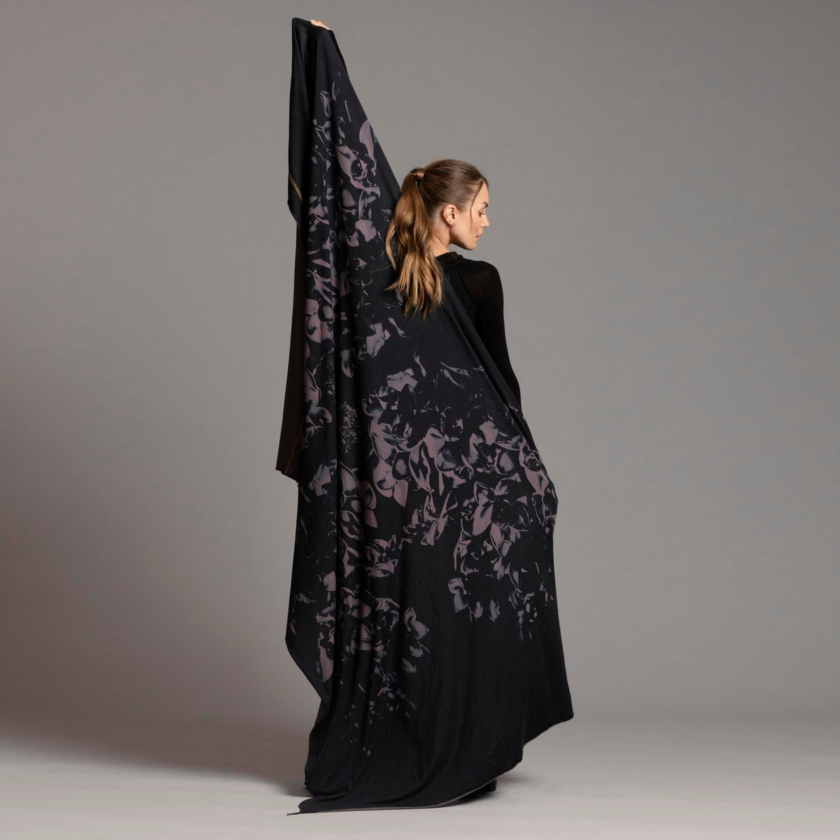 Woman modeling purple Benzova pattern nature wrap