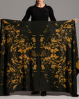 Woman modeling gold Benzova pattern nature wrap