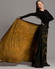 Woman modeling gold Benzova pattern nature wrap