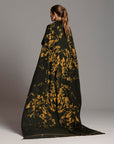 Woman modeling gold Benzova pattern nature wrap