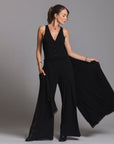 woman modeling the infinite bodysuit in black
