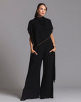 woman modeling the infinite bodysuit in black