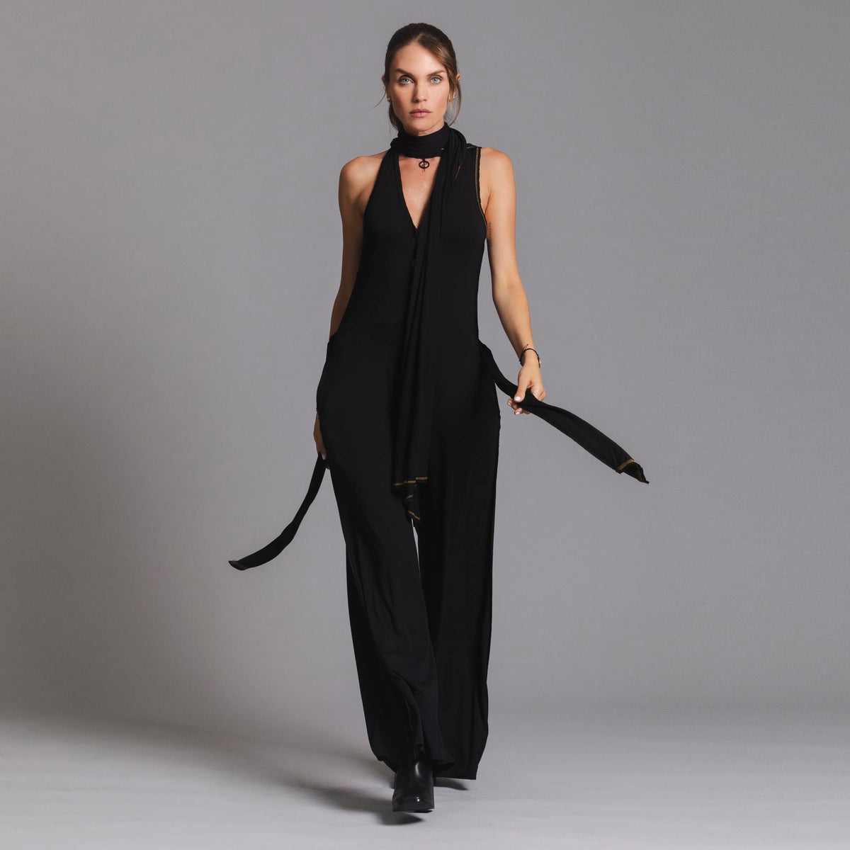 woman modeling the infinite bodysuit in black