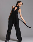 woman modeling the infinite bodysuit in black