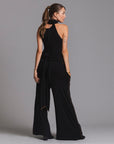 woman modeling the infinite bodysuit in black