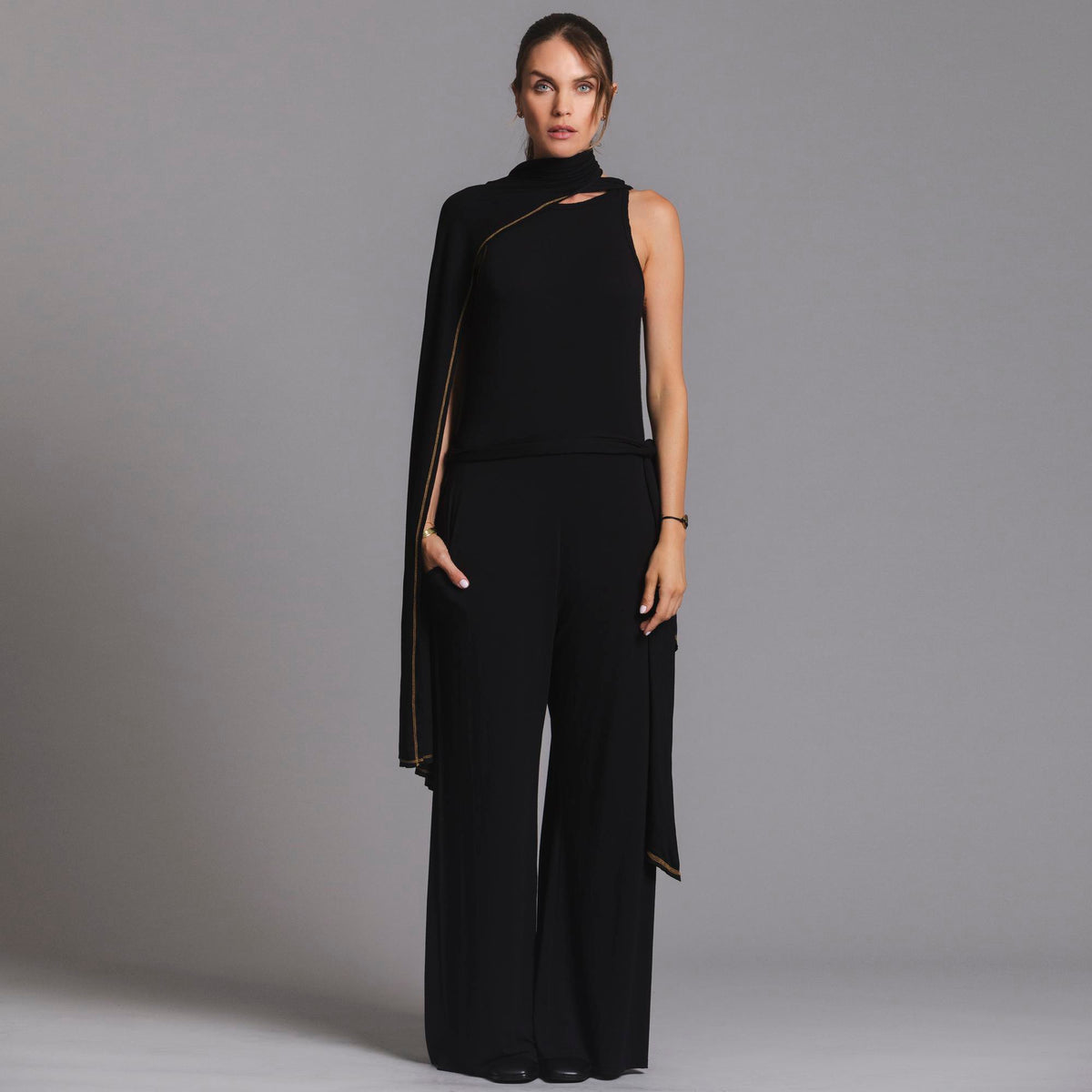 woman modeling the infinite bodysuit in black