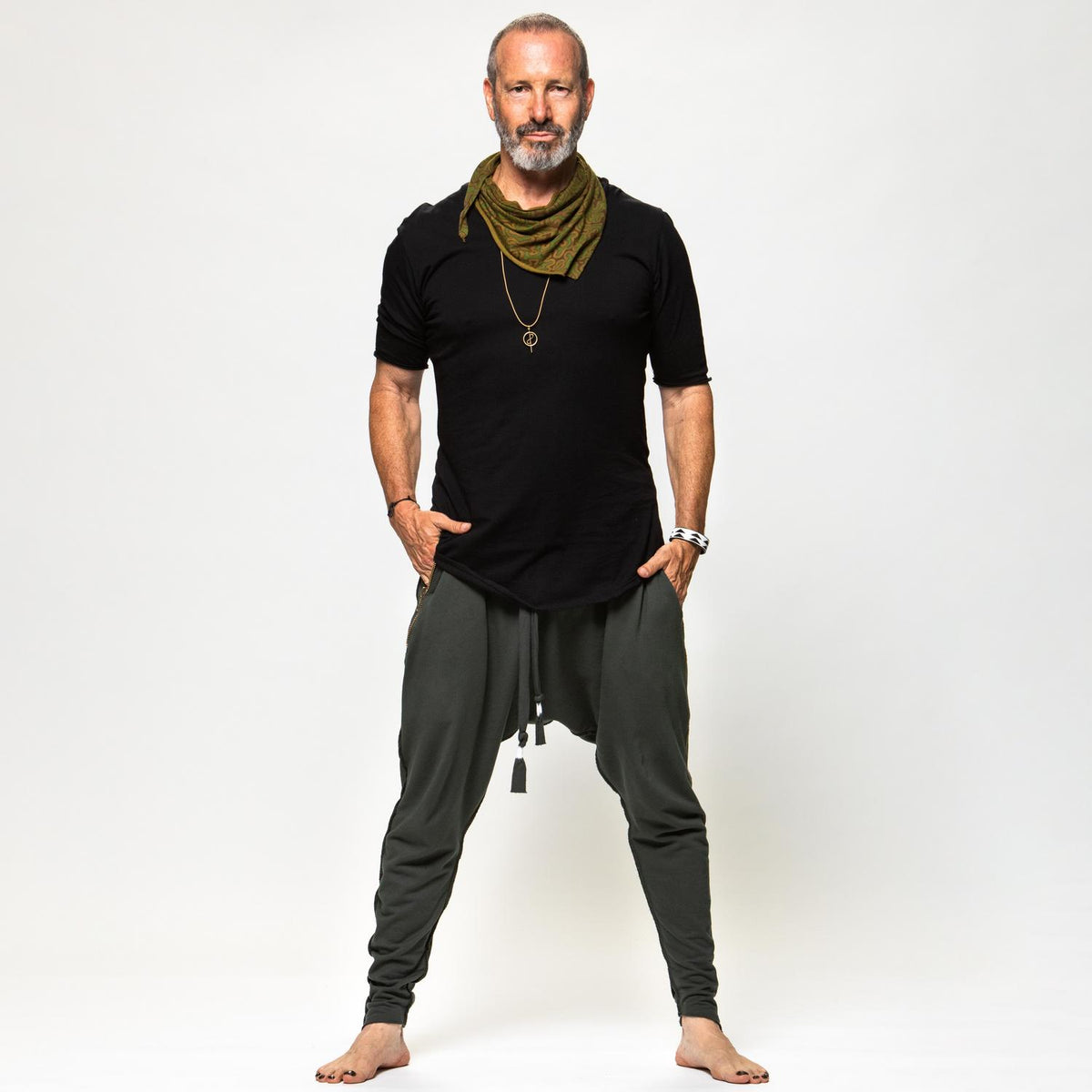 Male modeling Urban Forest green colored pants