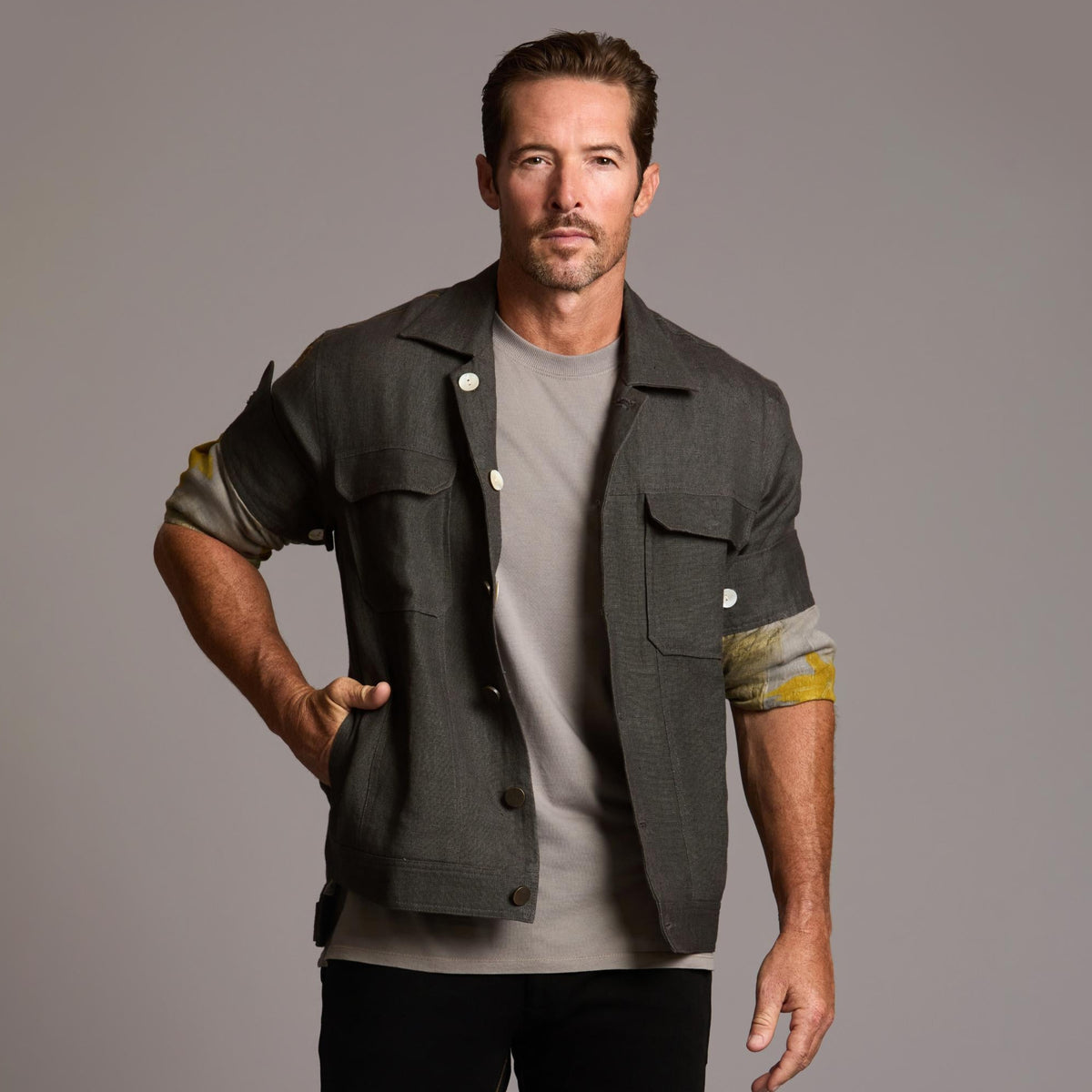 Male modeling smoke axis jacket