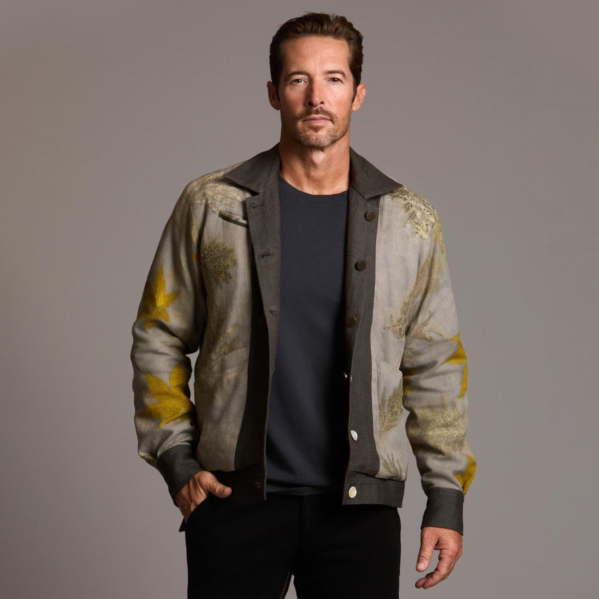 Male modeling smoke axis jacket