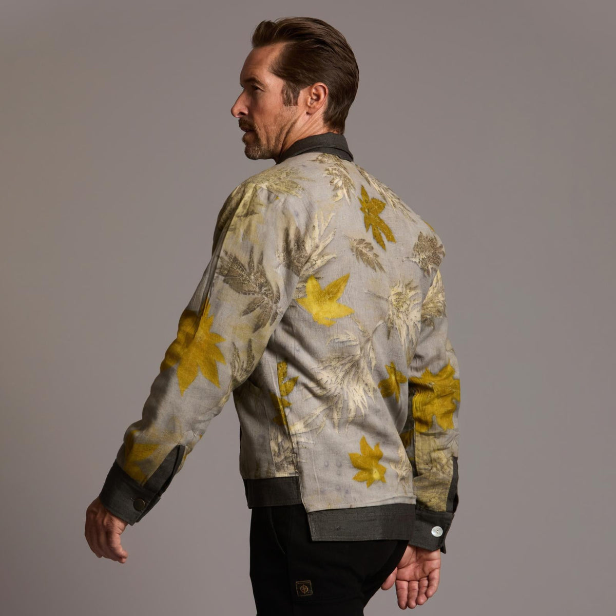 Male modeling smoke axis jacket